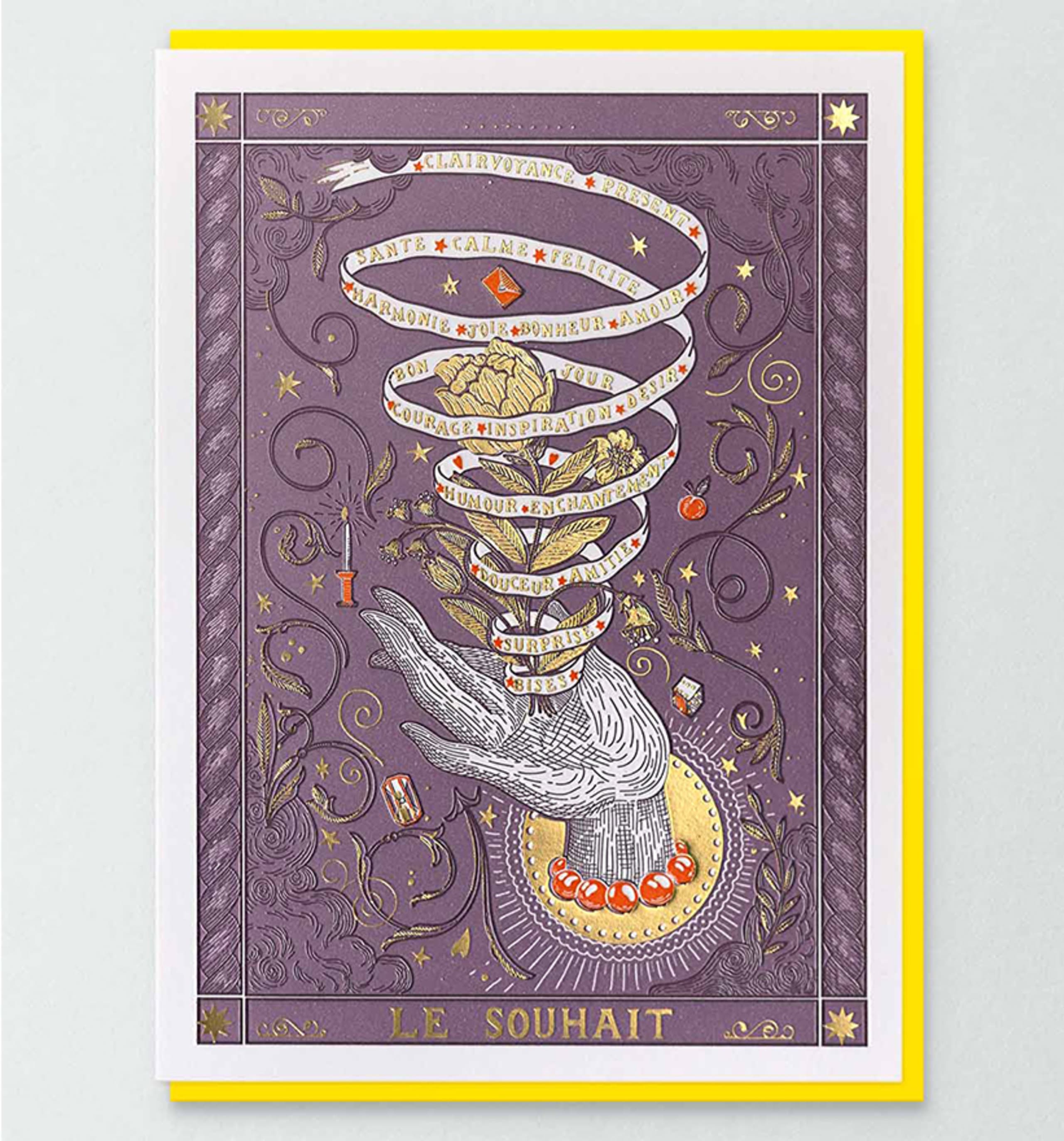 Carton de vœux violet avec main gravée tournée vers le haut, spirale de ruban doré, et couronne botanique.